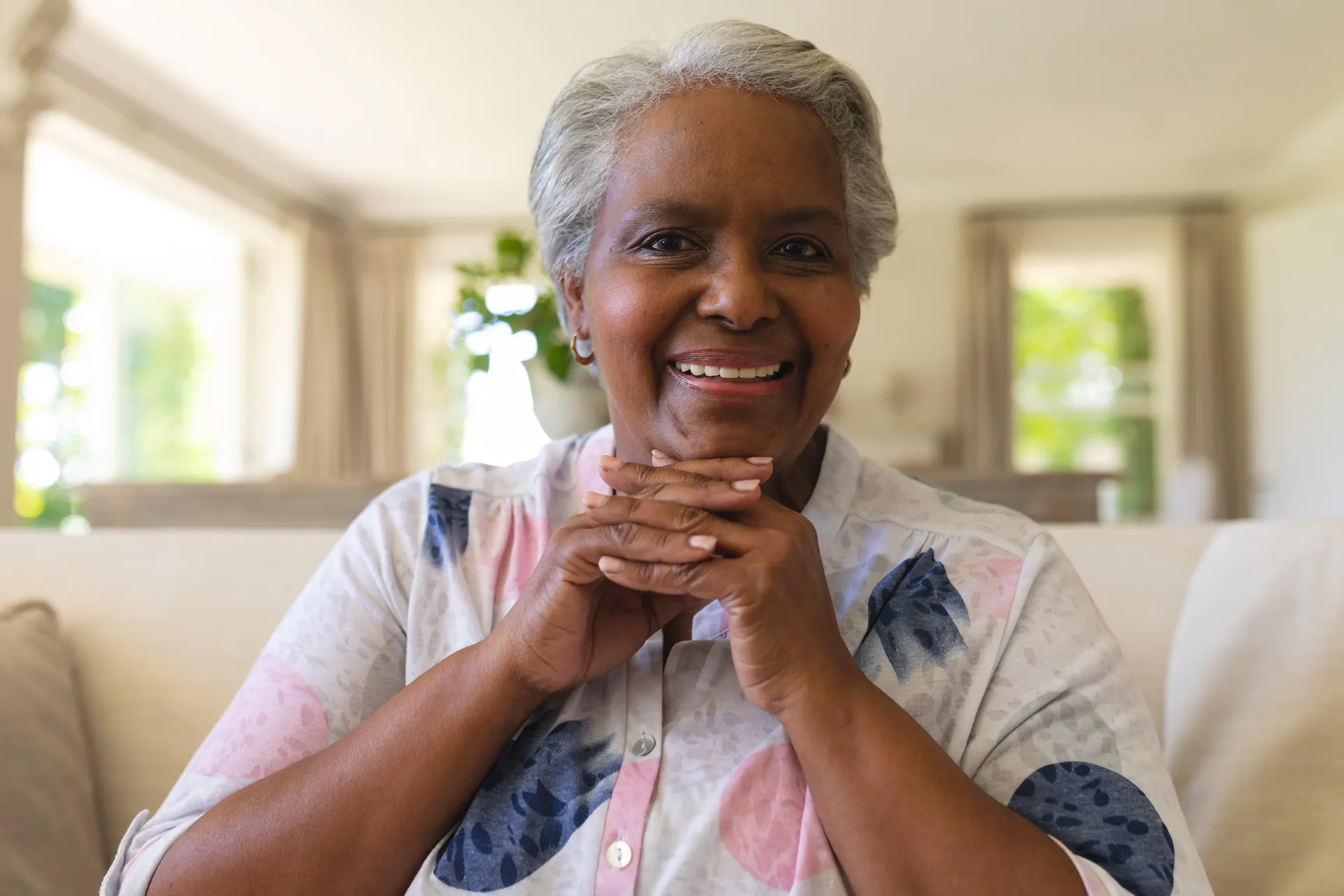 portrait-of-senior-african-american-woman-sitting-2023-11-27-05-03-09-utc